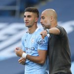 Ferran-Torres-talking-with-Pep-Guardiola