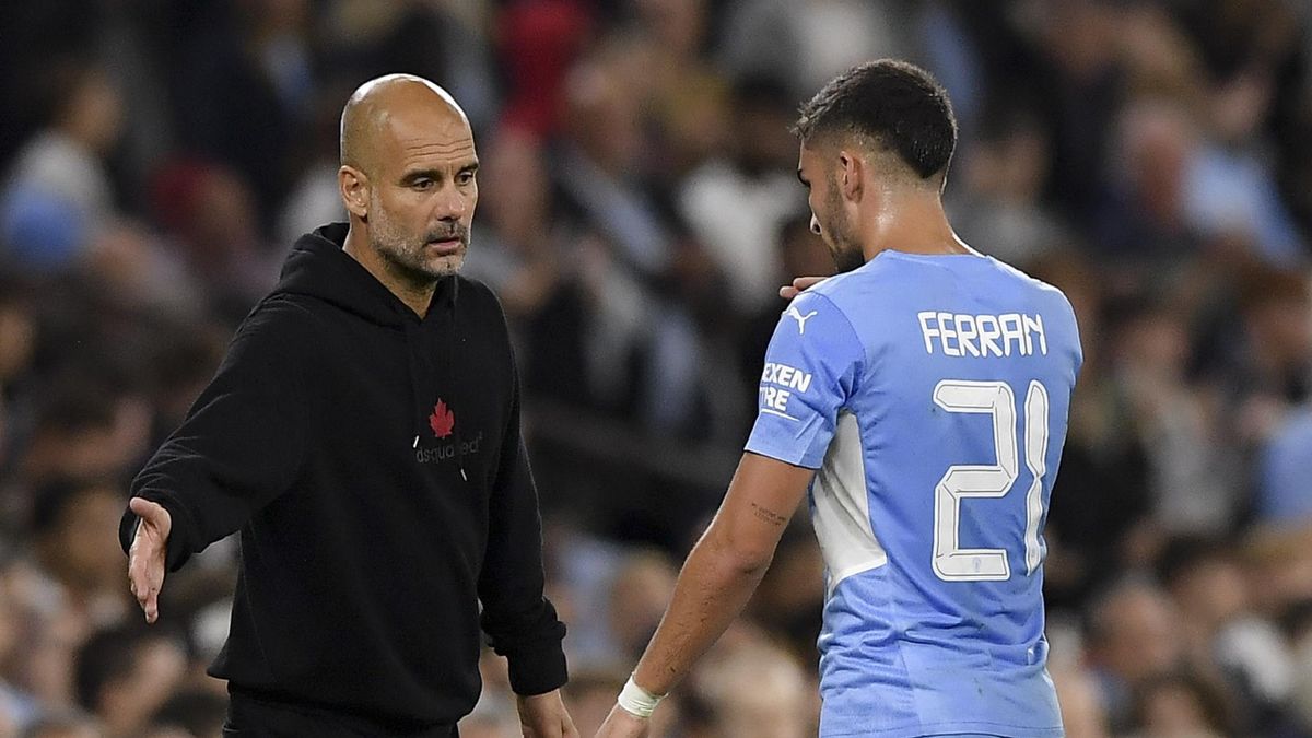 Pep Guardiola and Ferran Torres